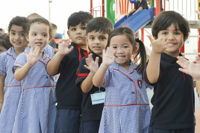 a group of children posing for a photo