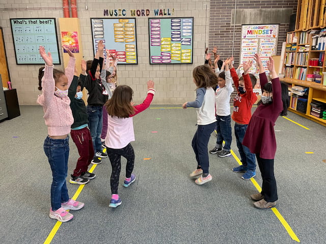 a group of children in a classroom