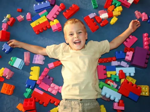 a baby playing with toys