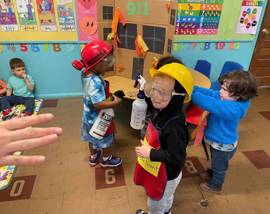 a group of children in a classroom