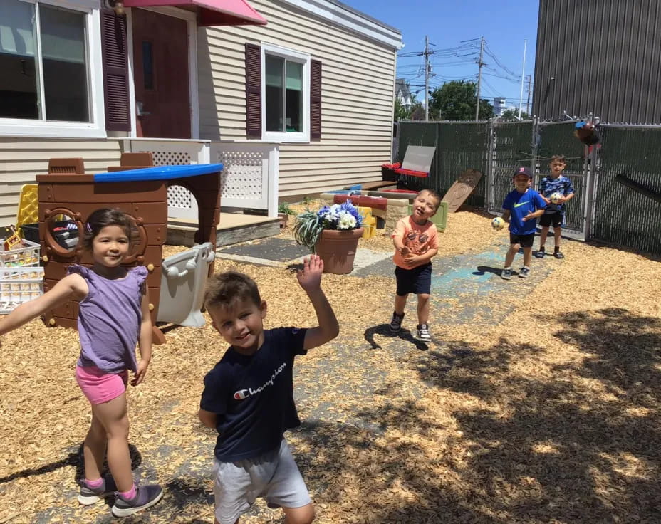 a group of children playing outside