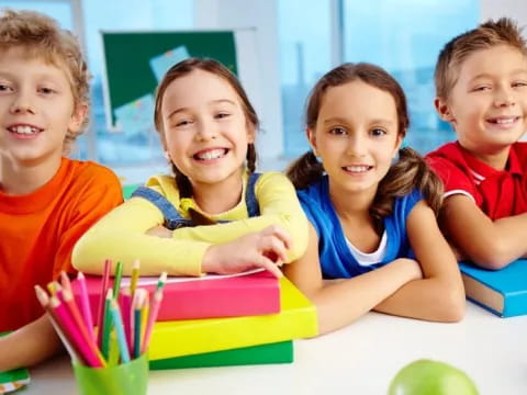 a group of children smiling