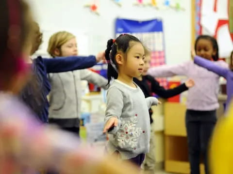 a group of children in a classroom