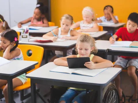 a group of children in a classroom