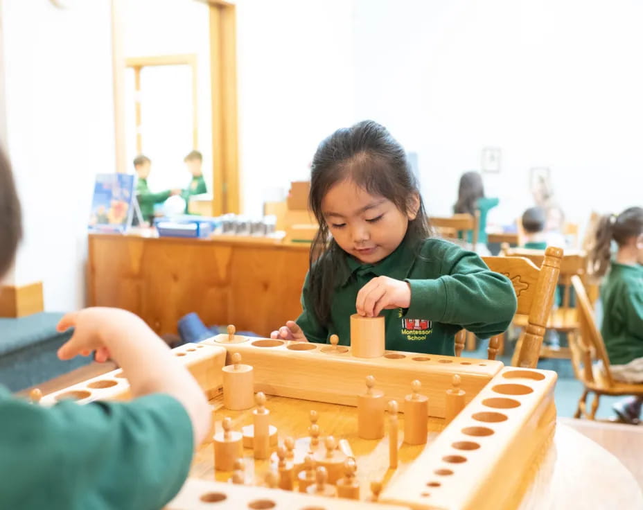 a group of children playing chess
