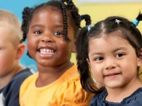 a group of children smiling