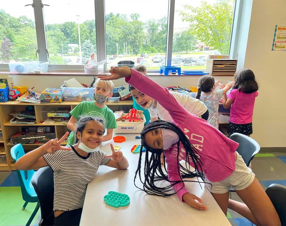 a group of children in a classroom