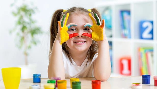 a girl with paint on her face