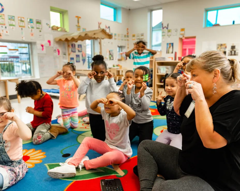 a person and a group of children