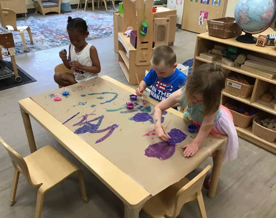 children sitting at a table