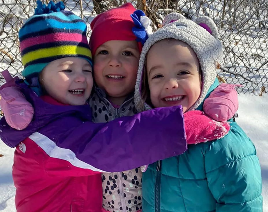a group of children smiling