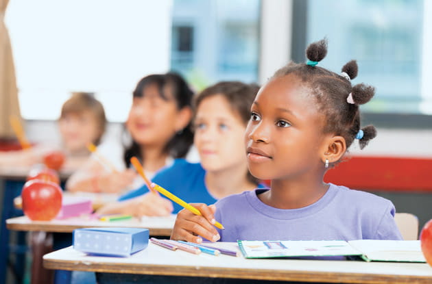 a group of children in a classroom