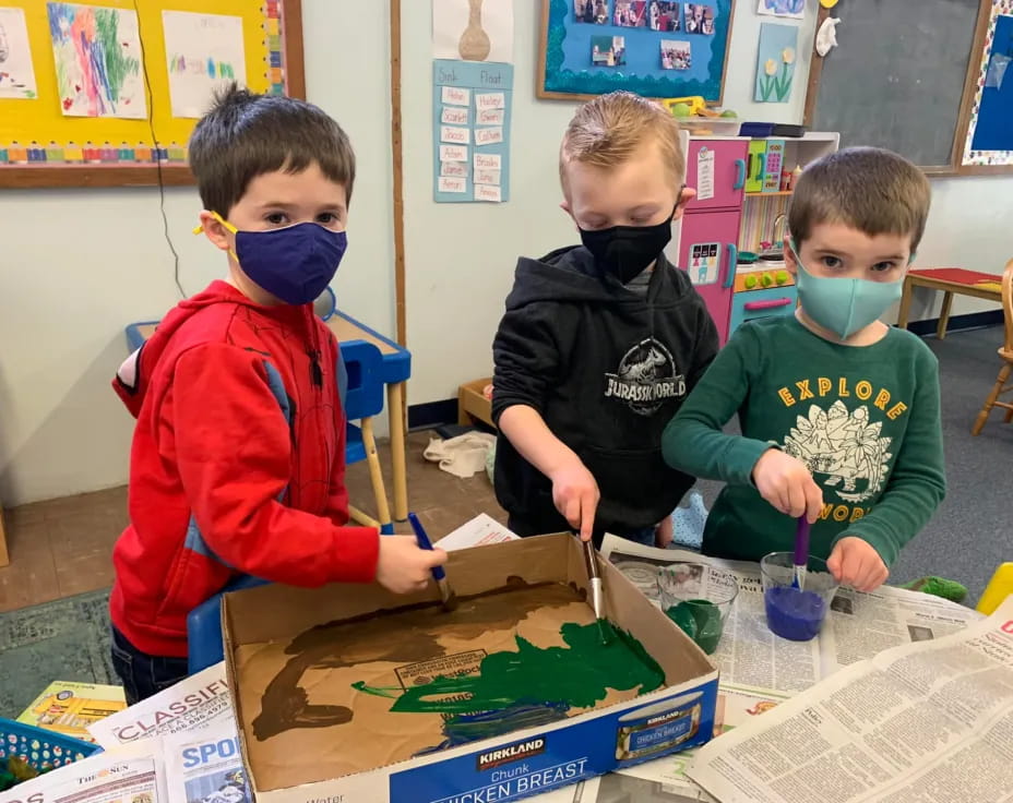 a group of children wearing masks