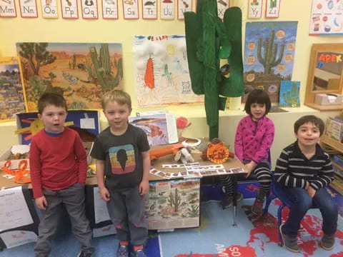 a group of children in a classroom