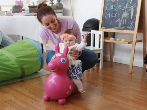 a person holding a baby