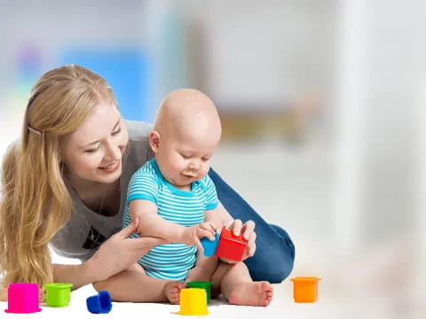 a person holding a baby