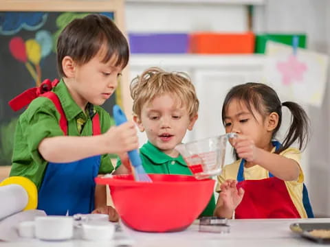 a group of children eating