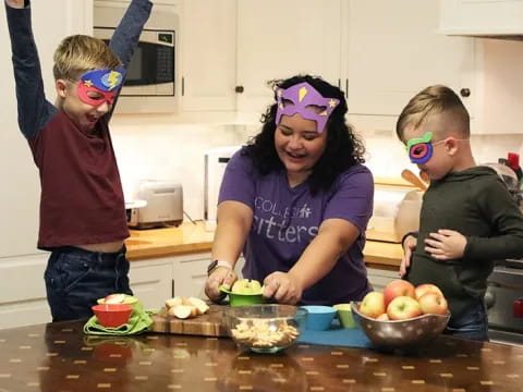 a person and two boys