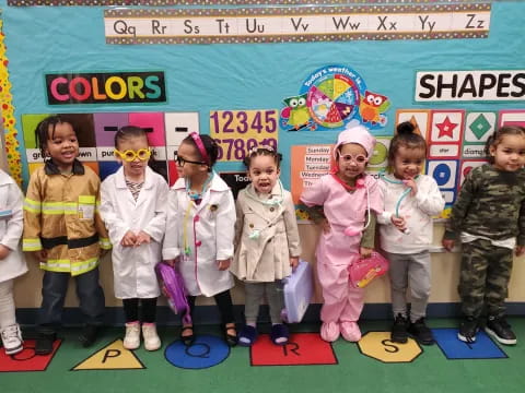 a group of children in clothing