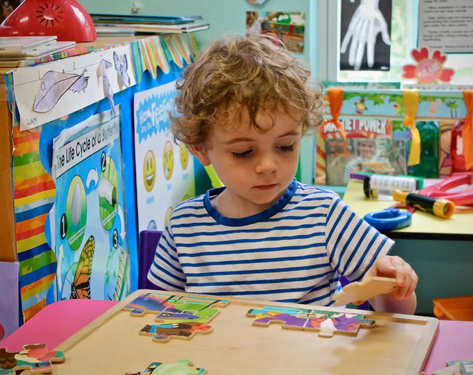 a child sitting at a table