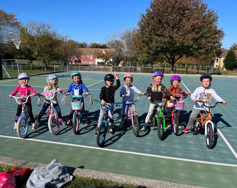 a group of kids on bikes