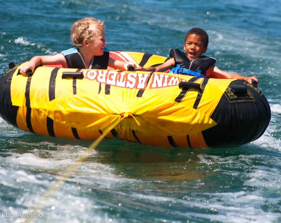 a couple of people in a raft