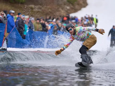 a man riding a water ski