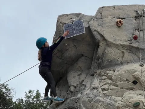 a man climbing a rock