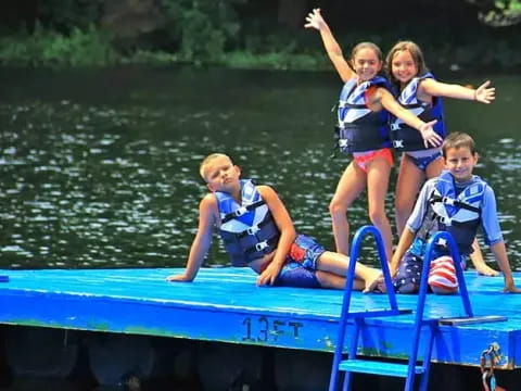 a group of kids on a raft