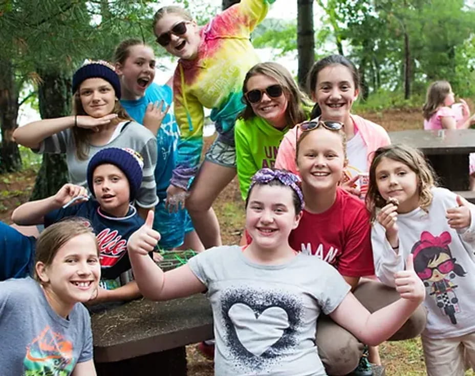 a group of people posing for a photo