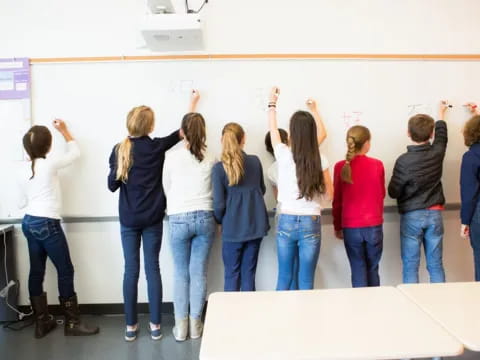a group of people in a classroom