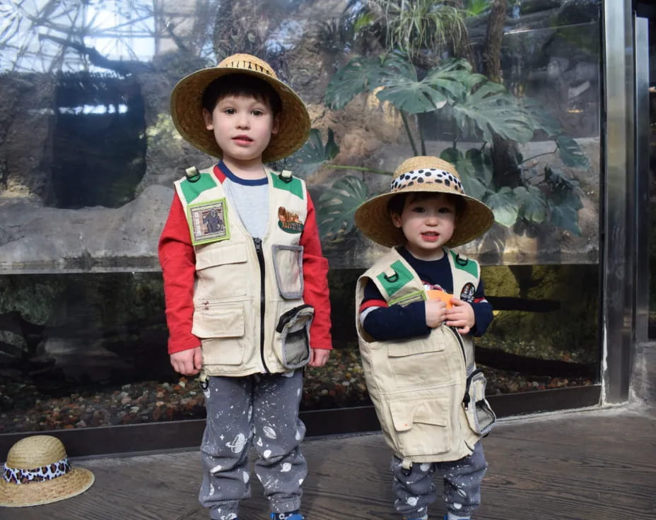 two children wearing hats