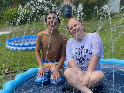two men in a pool