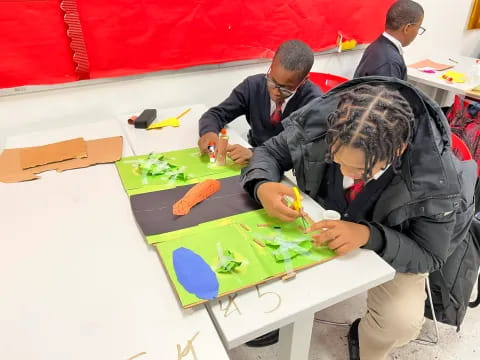 a group of people painting