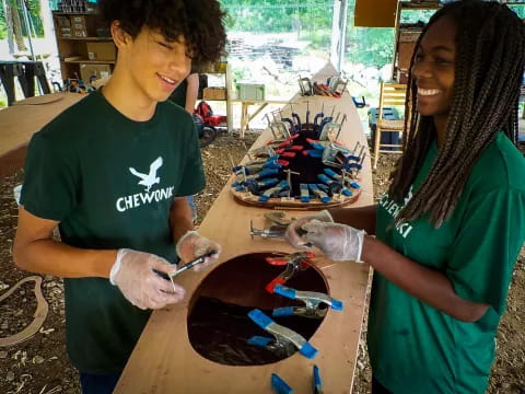 a man and a woman painting
