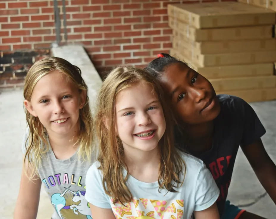 a person and two girls