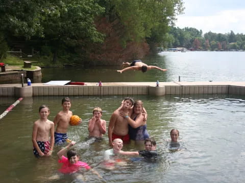 a group of people in a pool