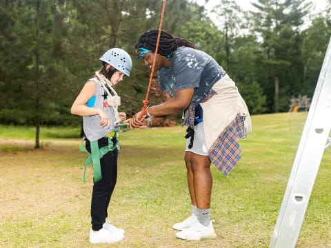a man and a woman playing golf
