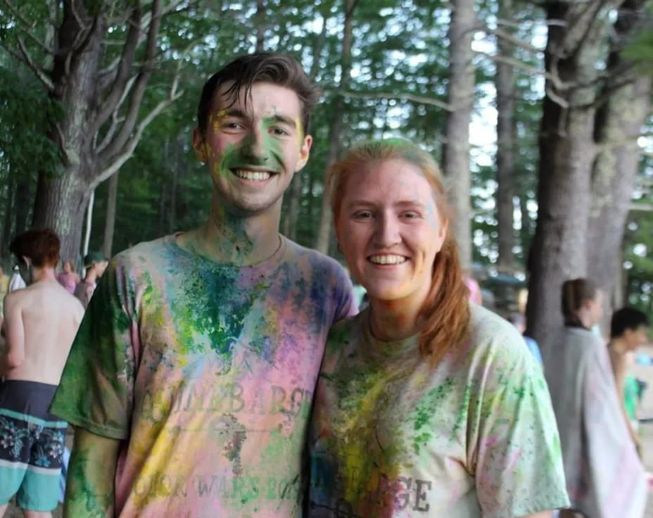 a man and woman smiling