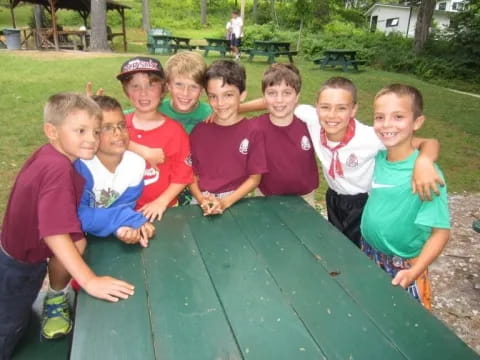 a group of kids posing for a photo