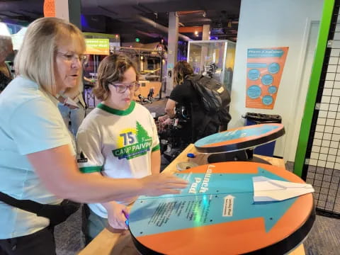 a couple of women playing a game