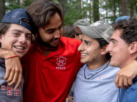 a group of men smiling