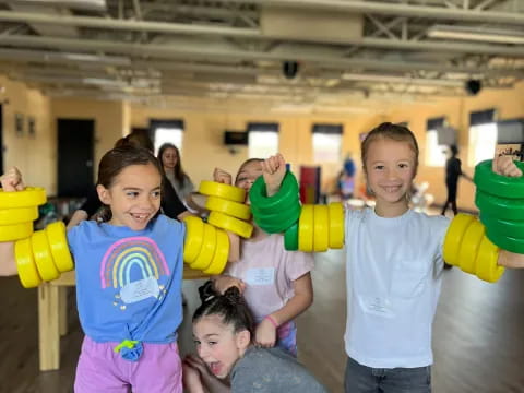 a group of kids playing with toys