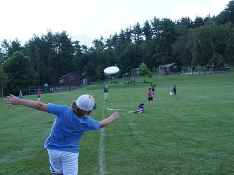 a man throwing a frisbee