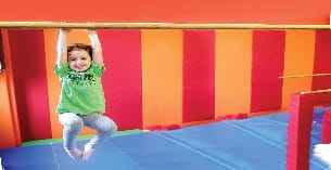 a child jumping in the air