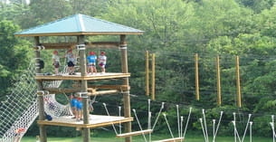 a group of people on a play structure