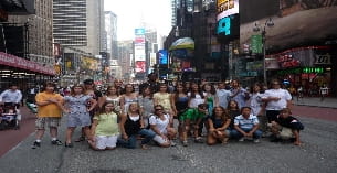 a group of people posing for a photo