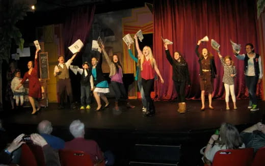 a group of people on a stage