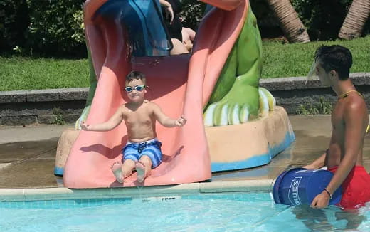 a group of people in a pool