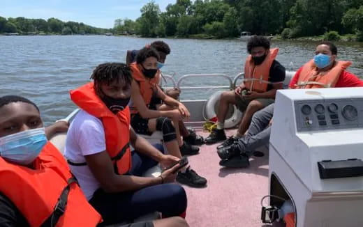 a group of people on a boat